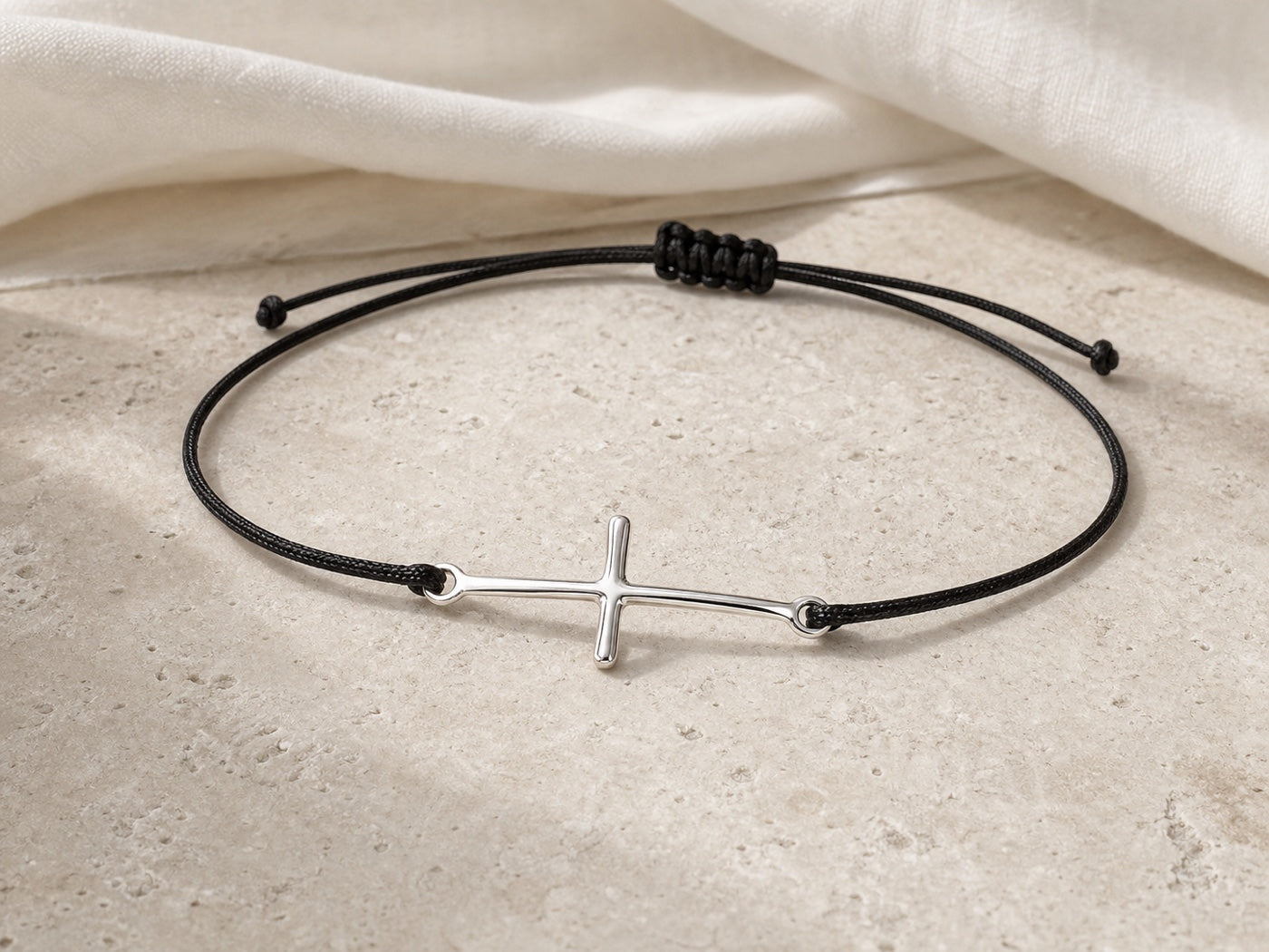 Silver cross cord bracelet