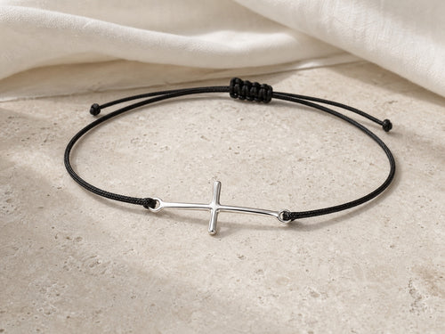 Silver cross cord bracelet