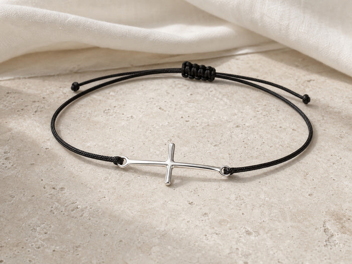Silver cross cord bracelet